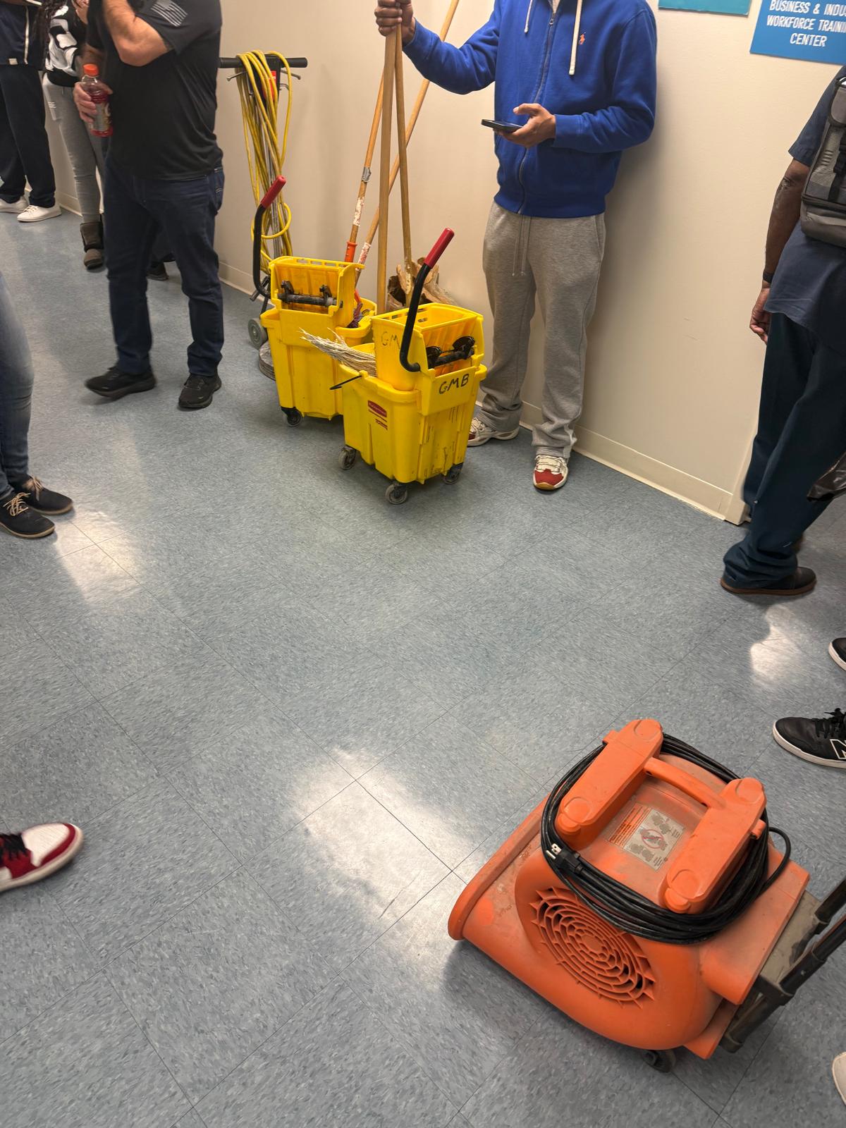Professional cleaning equipment including floor dryer and mop buckets